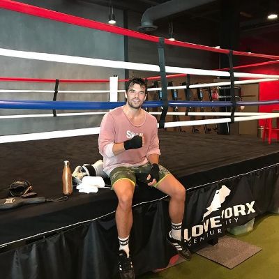 Picture of Josh Swickard in a boxing ring.